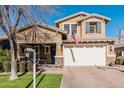 Two-story house with a large front yard, basketball hoop, and two-car garage at 4058 E Mesquite St, Gilbert, AZ 85296