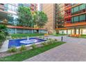 Attractive courtyard fountain with grassy areas and benches at 4808 N 24Th St # 605, Phoenix, AZ 85016