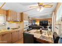 Bright kitchen with ample cabinetry and a dining area at 7807 E Main St # B-15, Mesa, AZ 85207