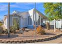 Front view of a house with desert landscaping at 8500 E Southern Ave # 506, Mesa, AZ 85209