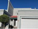 Close-up of townhouse entrance, showing architectural details and landscaping at 8719 N Fountain Dr, Peoria, AZ 85345