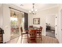 Bright dining area with table and chairs, near patio access at 900 S Canal Dr # 224, Chandler, AZ 85225