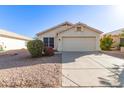 Front view of a single story home with a two-car garage at 901 N Longmore St, Chandler, AZ 85224