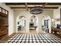 Elegant entryway with arched doorways and patterned tile at 9820 E Thompson Peak Pkwy # 646, Scottsdale, AZ 85255