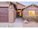 Front entry with security door and walkway to the home at 10512 E Dutchmans Trl, Gold Canyon, AZ 85118