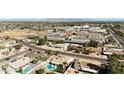 Aerial view showing home, pool, and surrounding area at 10618 N 27Th St, Phoenix, AZ 85028