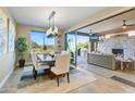 Bright dining room with sliding glass doors leading to the outdoor patio at 18022 E Vista Desierto --, Rio Verde, AZ 85263