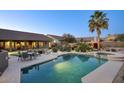 Relaxing pool and spa area with comfortable seating and a beautiful view at 23861 N 74Th Pl, Scottsdale, AZ 85255