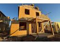 Two-story house under construction, showing framing and exterior features at 26111 N 23Rd Ave, Phoenix, AZ 85085