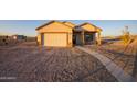 One story house with attached garage and covered porch at 34214 W Sahuaro St, Tonopah, AZ 85354