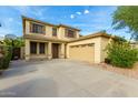 Charming two-story home with attached two-car garage and extended driveway at 60 W Beechnut Pl, Chandler, AZ 85248