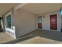 Covered entryway with double doors and a side window at 6334 W Vogel Ave, Glendale, AZ 85302