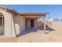 Covered carport with adjacent storage room at 6936 W Berkeley Rd, Phoenix, AZ 85035