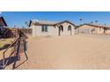 Landscaped front yard with gravel and a small walkway at 6936 W Berkeley Rd, Phoenix, AZ 85035