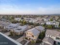 Aerial view of a luxury house nestled in a residential area at 904 E Hampton Ln, Gilbert, AZ 85295