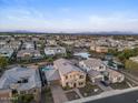 Aerial view showcasing a house in a community near a lake at 904 E Hampton Ln, Gilbert, AZ 85295