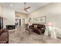 Living room features a fireplace and leather sofa at 178 Leisure World --, Mesa, AZ 85206