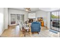 Cozy living room showcasing tile floors, fireplace, and sliding door access, perfect for relaxation and entertaining at 2315 W Union Hills Dr # 115, Phoenix, AZ 85027