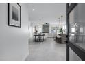 Bright entryway with view into open living and dining area at 2330 N 28Th Pl, Phoenix, AZ 85008