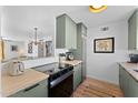 Eat-in kitchen features stainless steel appliances and light wood countertops at 4600 N 68Th St # 370, Scottsdale, AZ 85251