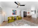 Living room with wood floors, comfortable seating and a view into dining area at 4600 N 68Th St # 370, Scottsdale, AZ 85251