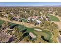 Home nestled on a golf course with lush landscaping; great location and views at 5817 E Leith Ln, Scottsdale, AZ 85254