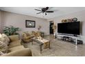 Living room with tiled floors and a sofa at 616 W Toledo St, Chandler, AZ 85225