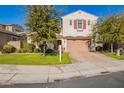 Two-story home with a two-car garage and well-manicured lawn at 918 W Yellowstone Way, Chandler, AZ 85248