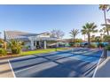 Large backyard with a pool, patio, and pickleball court at 12528 N 78Th St, Scottsdale, AZ 85260