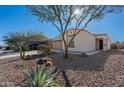 Front yard view of a one-story house with desert landscaping at 12657 W Myrtle Ave, Glendale, AZ 85307