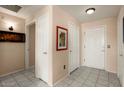 Inviting entryway with tiled floors and neutral wall colors at 14950 W Mountain View Blvd # 3209, Surprise, AZ 85374