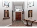 Bright and spacious entryway with hardwood floors and decorative niches at 758 S Lagoon Dr, Gilbert, AZ 85233