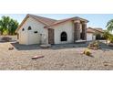 Landscaped front yard with gravel and desert plants at 9715 W Escuda Dr, Peoria, AZ 85382