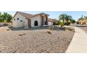 Landscaped front yard with gravel and desert plants at 9715 W Escuda Dr, Peoria, AZ 85382