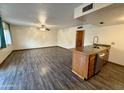 Living room features wood-look floors at 1051 N 84Th Pl, Scottsdale, AZ 85257