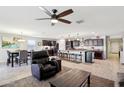 Open concept kitchen with island, stainless steel appliances, and ample counter space at 1436 N Claiborne --, Mesa, AZ 85205
