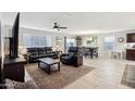 Spacious living room with hardwood floors and large windows at 1436 N Claiborne --, Mesa, AZ 85205