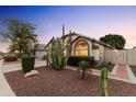 Desert landscaping enhances this charming single-story home's curb appeal at 18807 N 2Nd Ave, Phoenix, AZ 85027