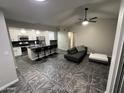 Open concept kitchen with island and granite countertops at 200 E Southern Ave # 242, Tempe, AZ 85282