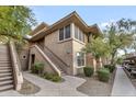 Attractive condo complex with beautiful desert landscaping and staircase access to the upper units at 20100 N 78Th Pl # 1062, Scottsdale, AZ 85255