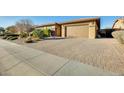 Brick driveway and walkway to a house at 2238 E Saddlebrook Rd, Gilbert, AZ 85298
