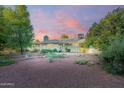 Spacious backyard with desert landscaping and patio at 8201 E Monterey Way, Scottsdale, AZ 85251