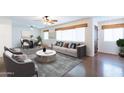 Bright living room with dining area and hardwood floors at 8201 E Monterey Way, Scottsdale, AZ 85251