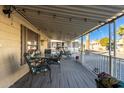 Covered patio with outdoor seating and string lights at 9333 E University Dr # 147, Mesa, AZ 85207