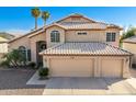 Two-story house, three-car garage, and spacious driveway at 1231 N Layman St, Gilbert, AZ 85233