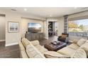 Living room with a built-in entertainment center at 16310 W Boulder Dr, Surprise, AZ 85374