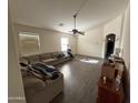 Bright living room with vaulted ceilings and neutral color palette at 24013 N Mojave Ln, Florence, AZ 85132