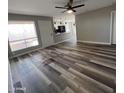 Living room with wood-look flooring and neutral walls at 409 W Pontiac Dr # 8, Phoenix, AZ 85027