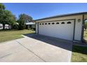 Two-car garage with a wide driveway at 4829 E Lake Point Cir, Phoenix, AZ 85044