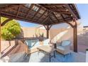 Relaxing gazebo with comfortable seating, perfect for outdoor entertaining at 9336 E Obispo Ave, Mesa, AZ 85212